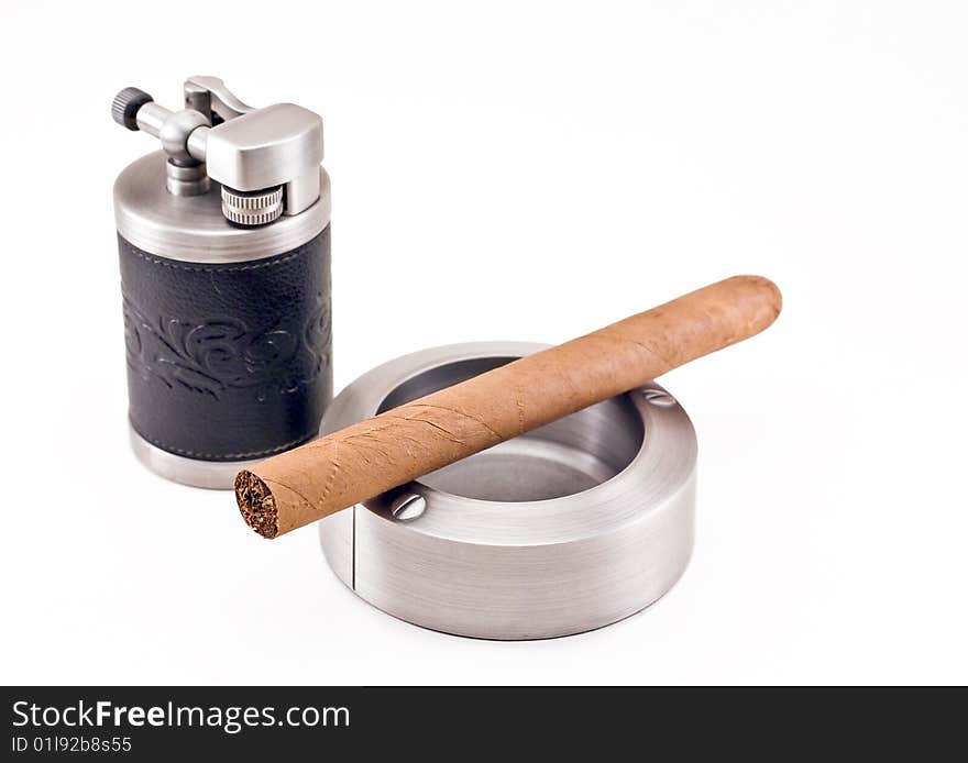 Stylish elegant metallic ashtray, lighter and cuban cigar. Stylish elegant metallic ashtray, lighter and cuban cigar