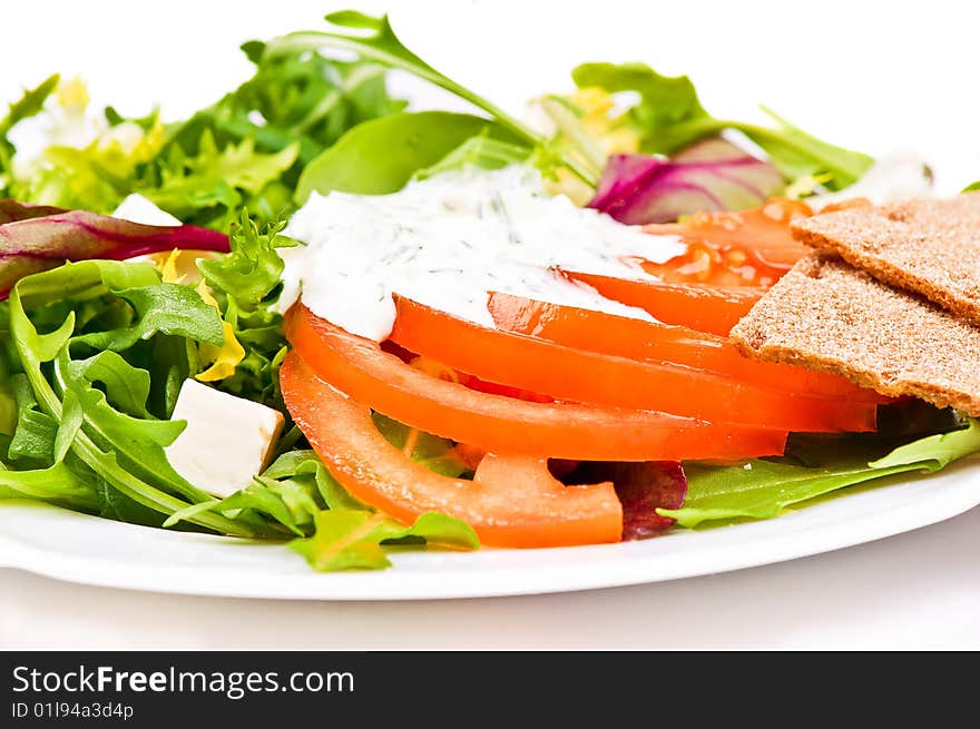 Salad with tomatoes and sheep cheese