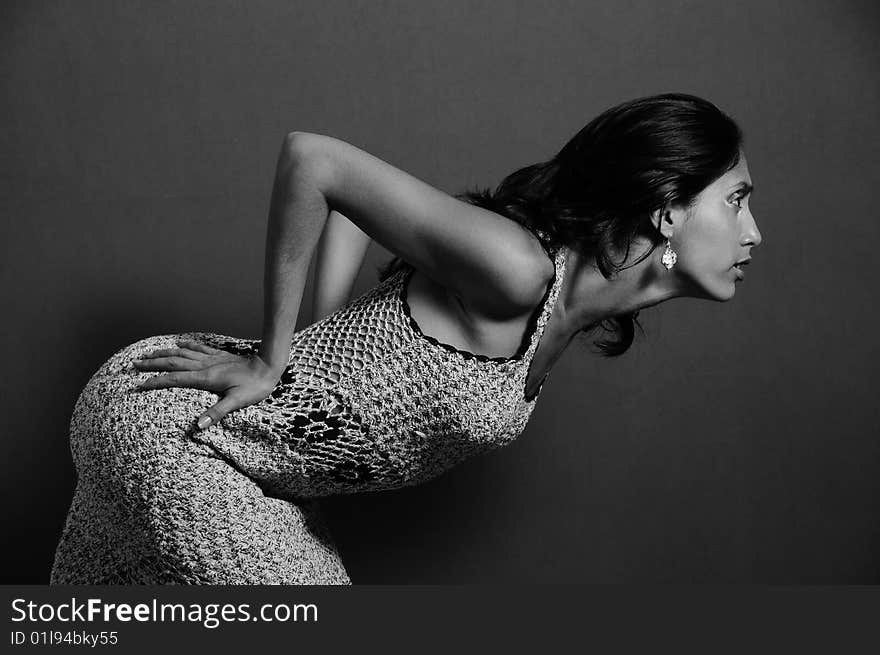 Portrait of young hispanic dancer woman posing in black and white