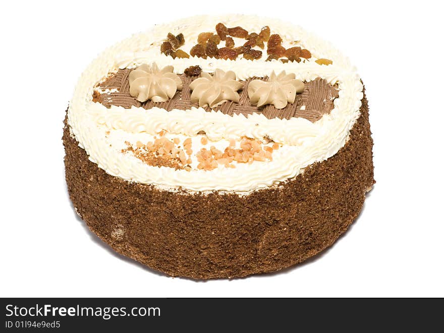 Cake is with cream, raisin and peanut. Cake is with cream, raisin and peanut