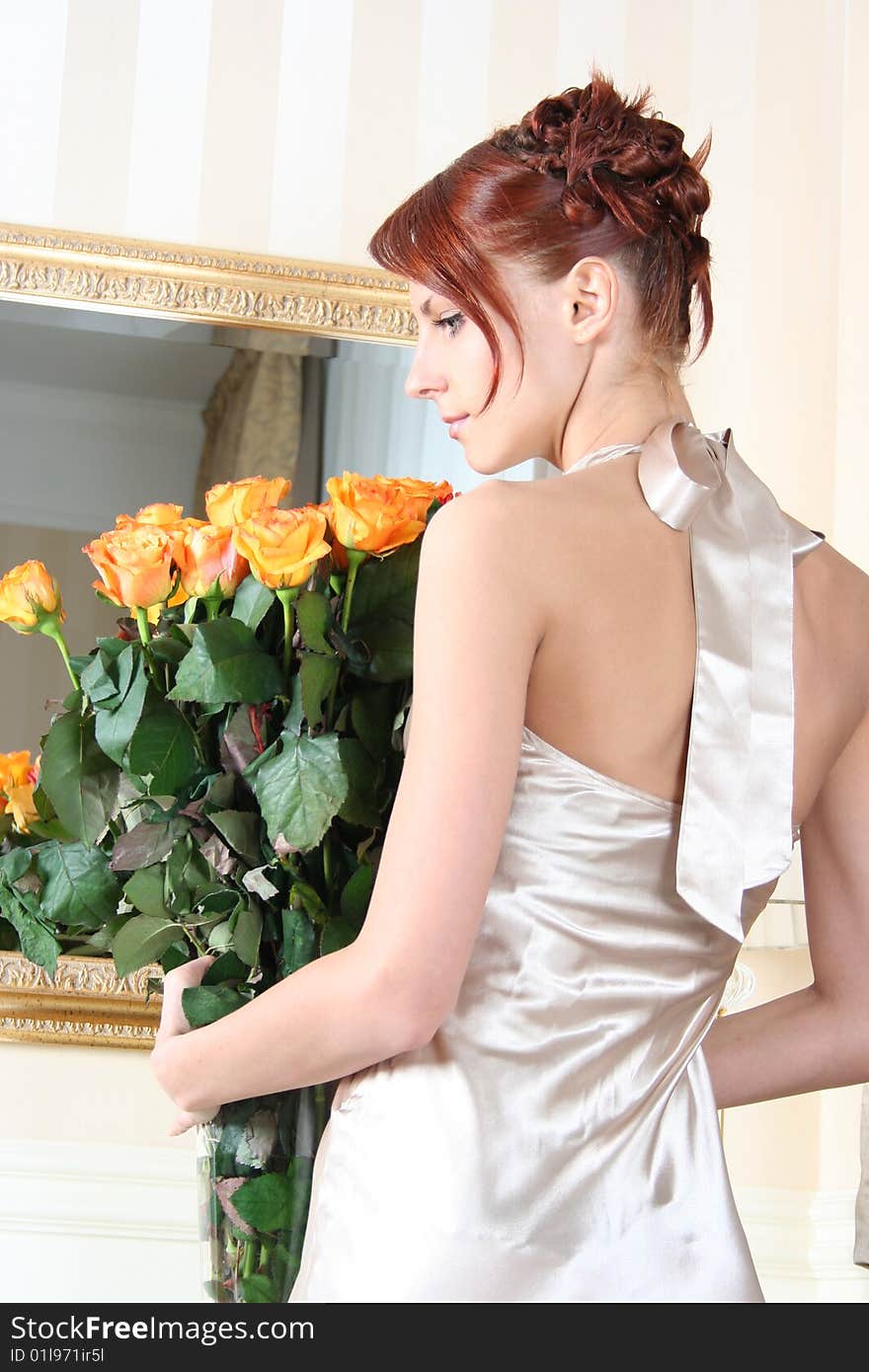 Beautiful young girl with flowers. Beautiful young girl with flowers