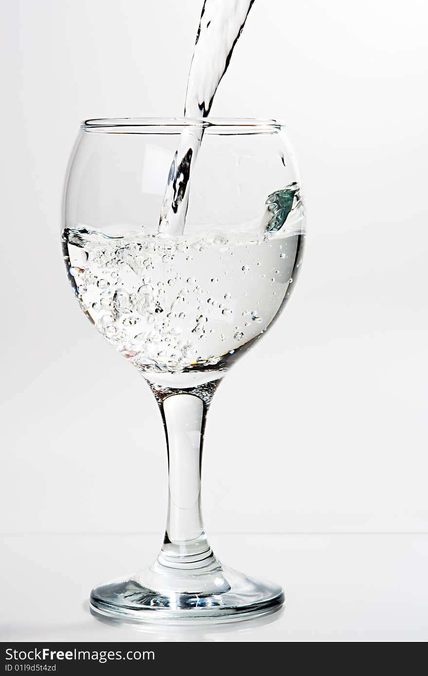 Wine glass with poured water