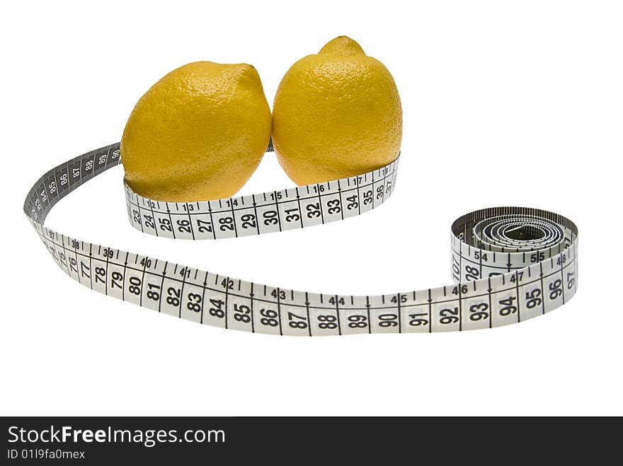 Two lemons and a measuring tape isolated on white background