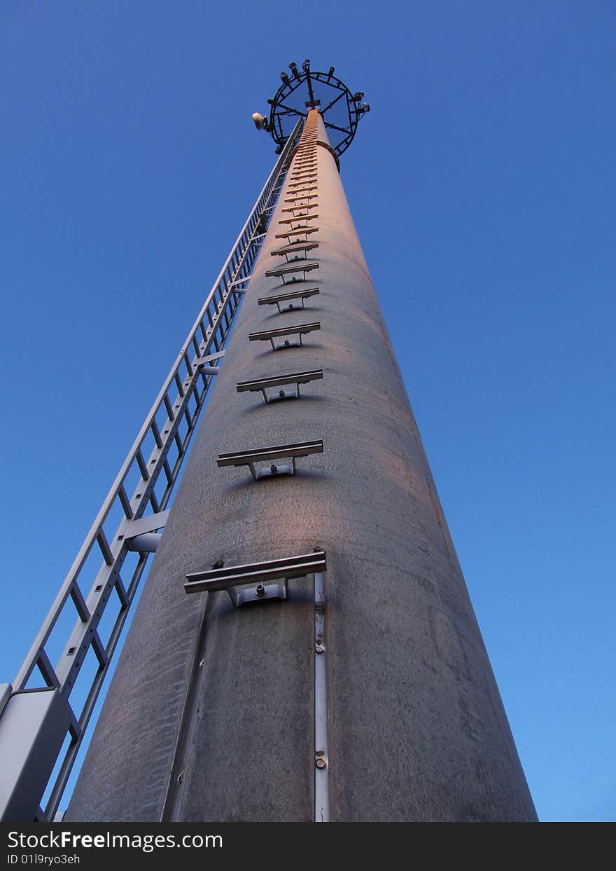 Communication tower on the blue sky