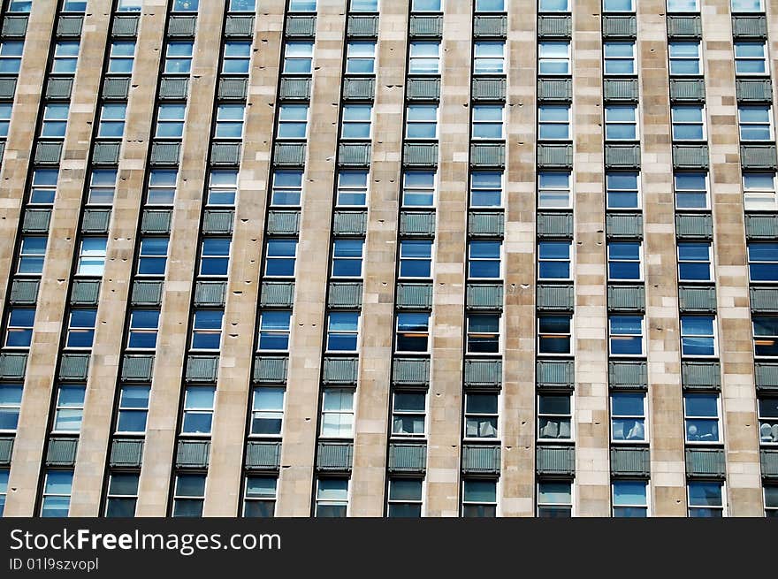 Close-up of a building's exterior showing lines and patterns