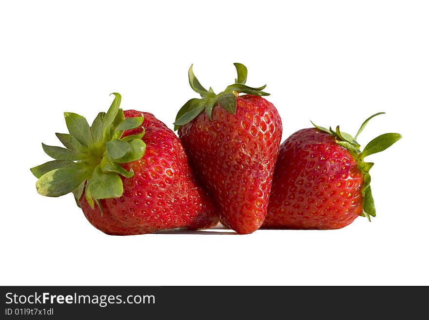 Three red strawberry isolated on white background. Three red strawberry isolated on white background