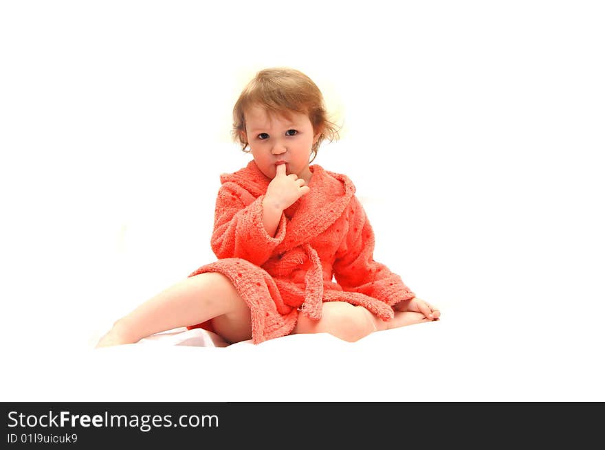 Portrait of the little girl in a dressing gown