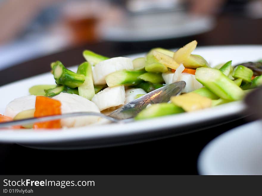 Delicious Chinese seafood dish in white plate