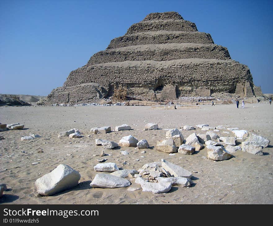 Step pyramid of zooser in Egypt agains the blue sky