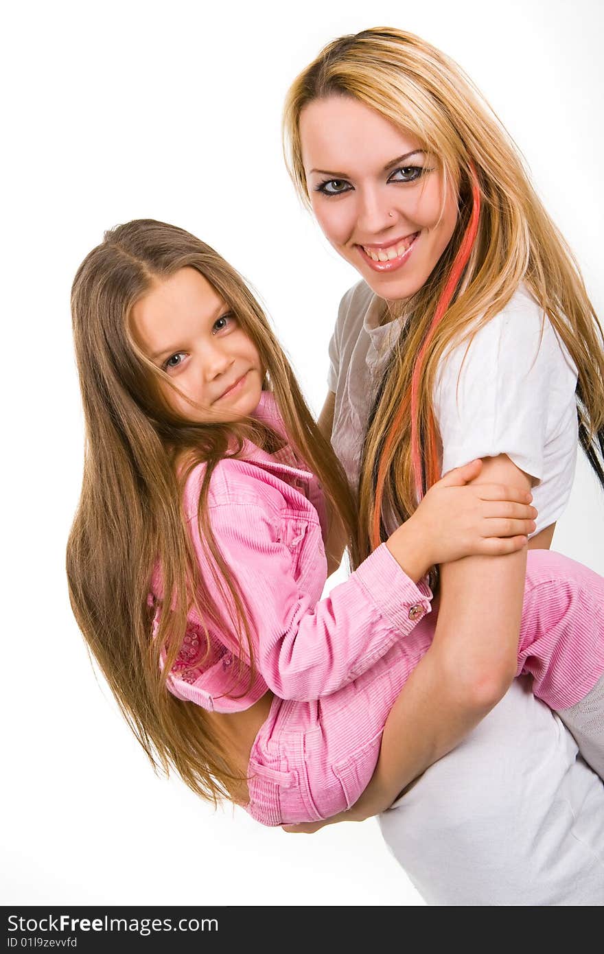 Mother playingwith daughter isolated on white