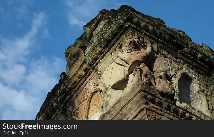 A Garuda sculpture on a pillar in Preah Khan of Angkor (Siem Reap). A Garuda sculpture on a pillar in Preah Khan of Angkor (Siem Reap)