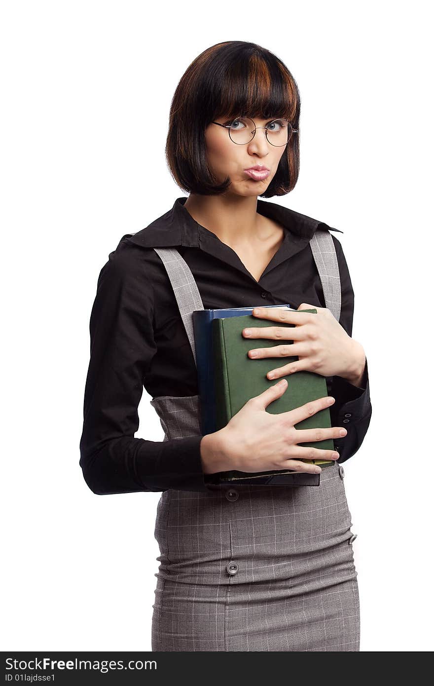 Injured brunette schoolgirl hold books in the hands over white background