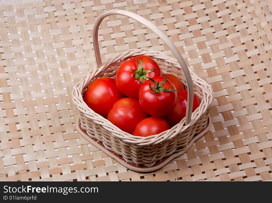 Tomato Basket With Bamboo Mat Background