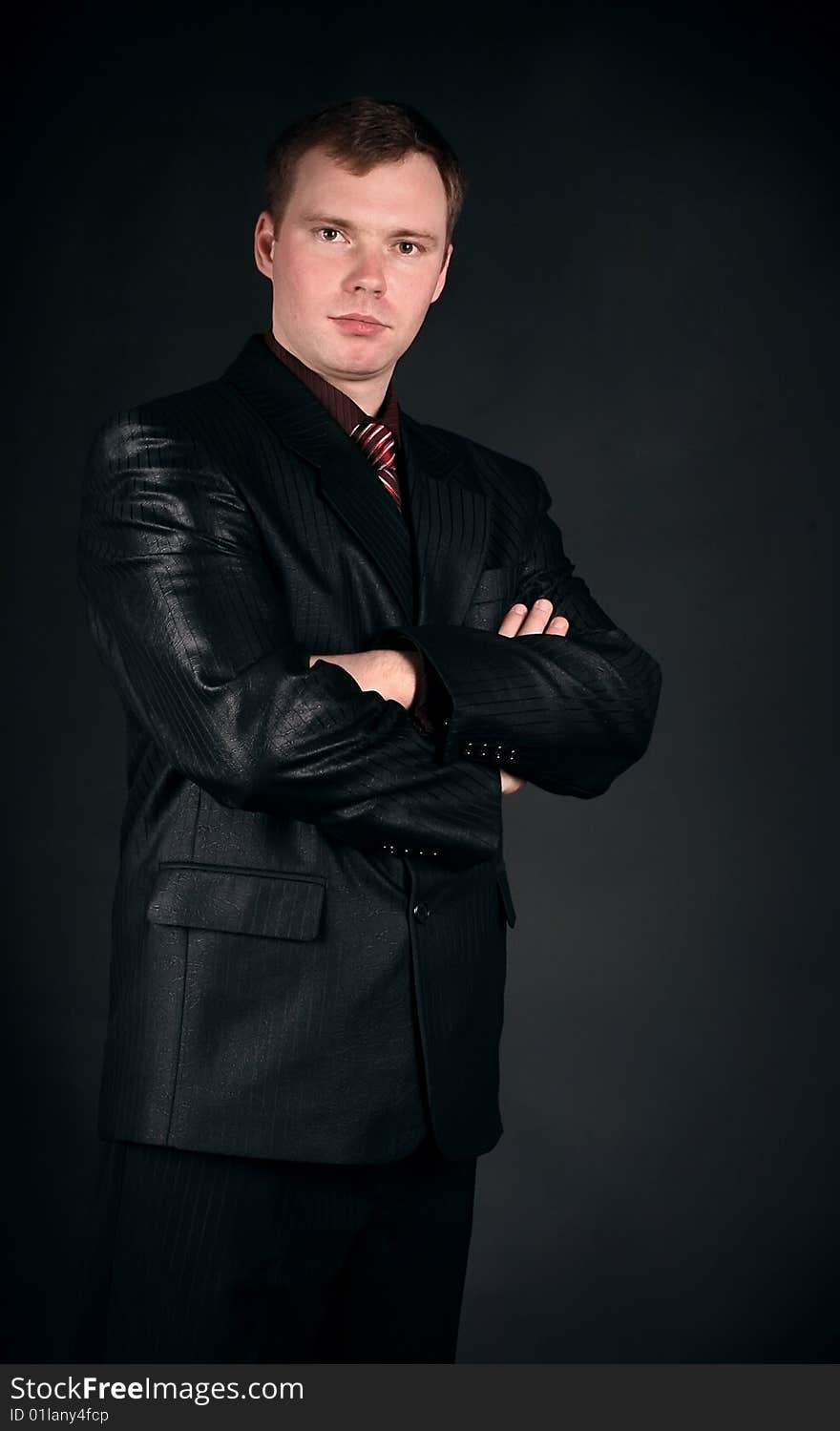 Young Man On A Black Background