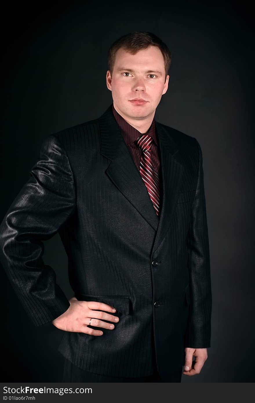 Young Man On A Black Background