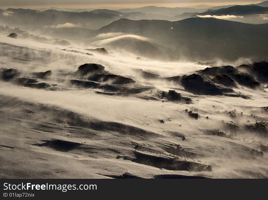 Windy conditions with blowing and drifting snow at mount washington. Windy conditions with blowing and drifting snow at mount washington