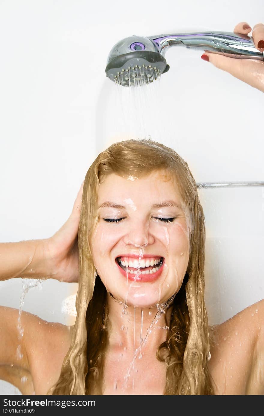 Pretty woman taking a shower