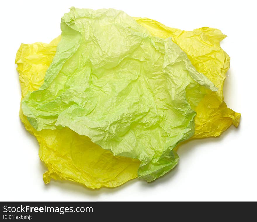 Yellow and green crumpled paper isolated on white. Yellow and green crumpled paper isolated on white