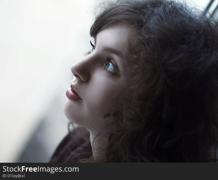 Portrait of young charming girl