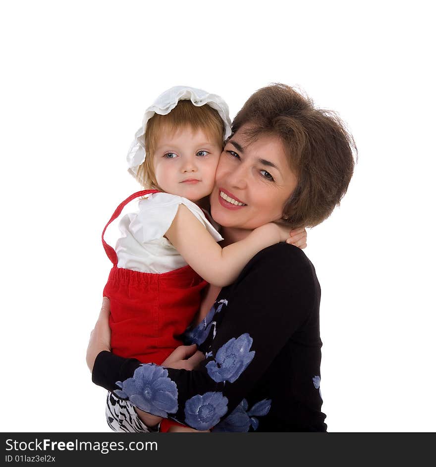 Grandmother hold her small daughter. Studio isolated