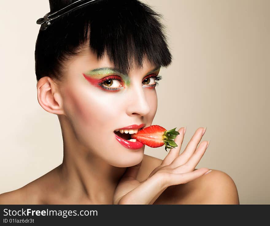 Portrait of young girl witn fresh strawberry. Portrait of young girl witn fresh strawberry