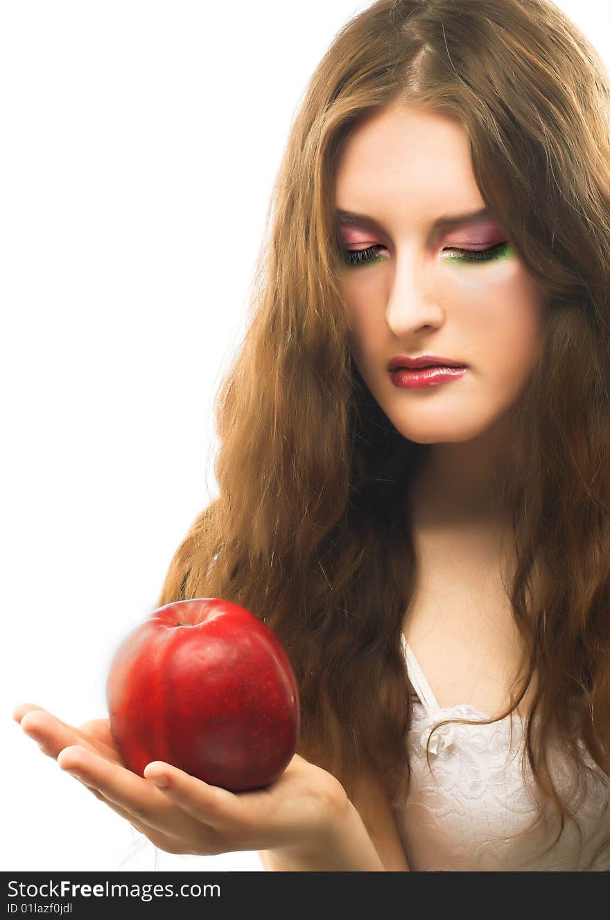 Portrait of young girl witn fresh red apple in her hand. Portrait of young girl witn fresh red apple in her hand