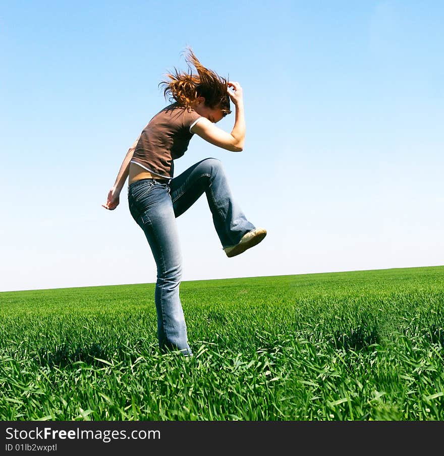 Jumping girl on natural background