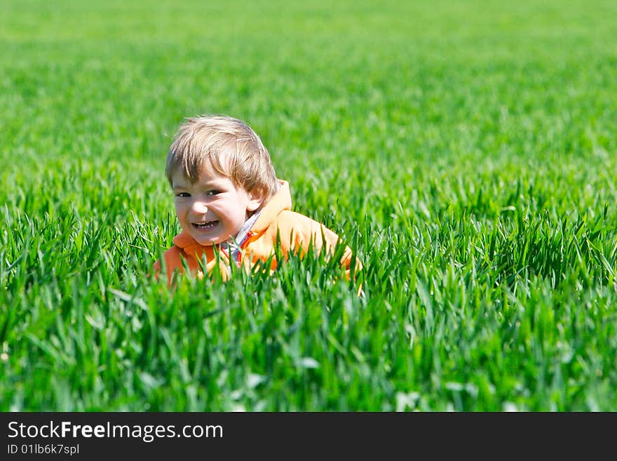 Boy In Green Grass