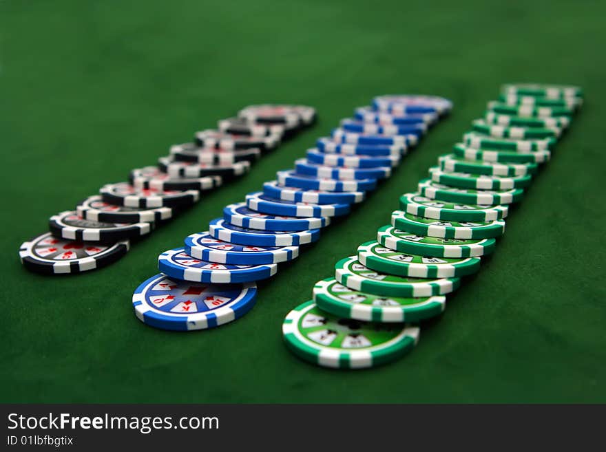 Poker table with chips in a row