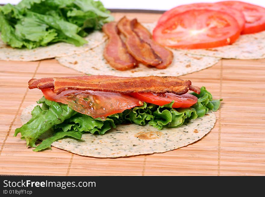 Bacon, lettuce and tomato wrap ingredients. Bacon, lettuce and tomato wrap ingredients