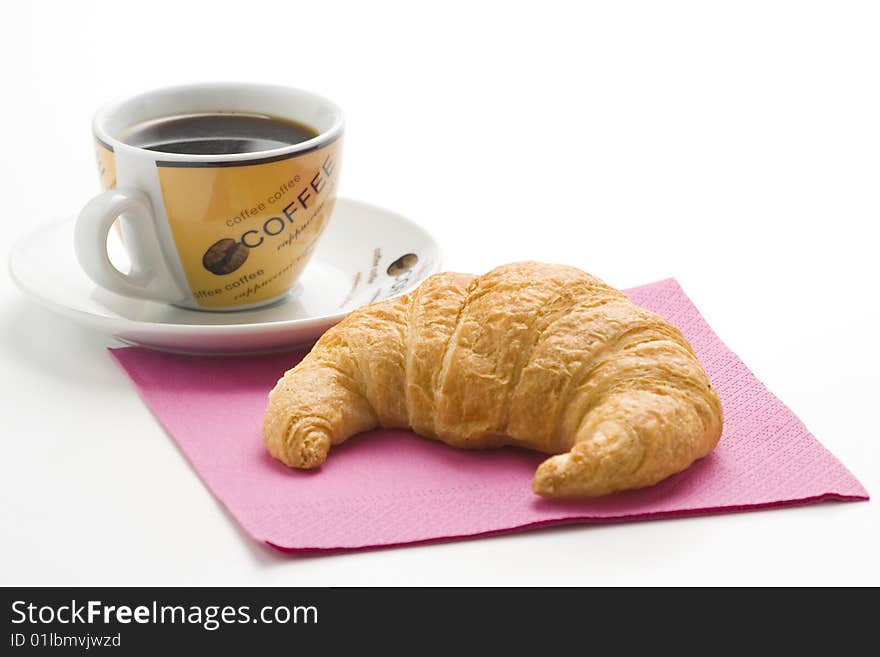 Continental Breakfast Of Coffee And Croissants