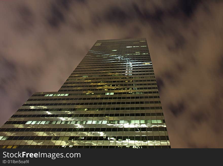 Night view of Los Angeles skyscrapers and cloudy sky