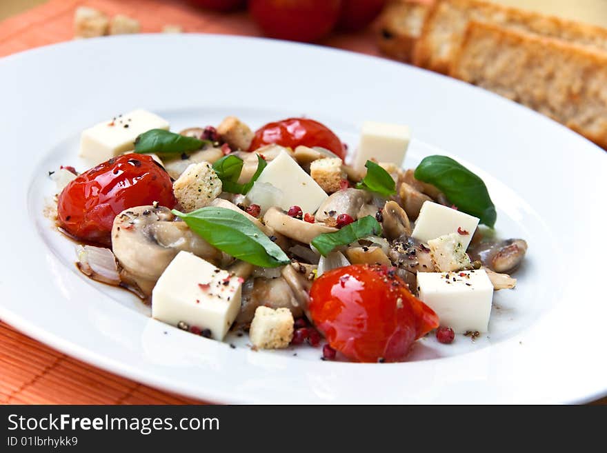 Mozzarella with mushrooms , mint ant baked cherry