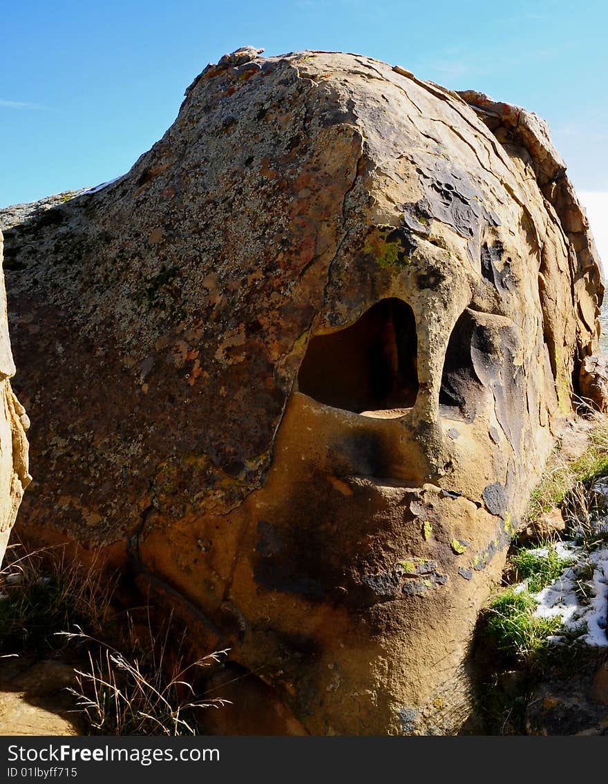 A rock found with a skeleton looking face. A rock found with a skeleton looking face