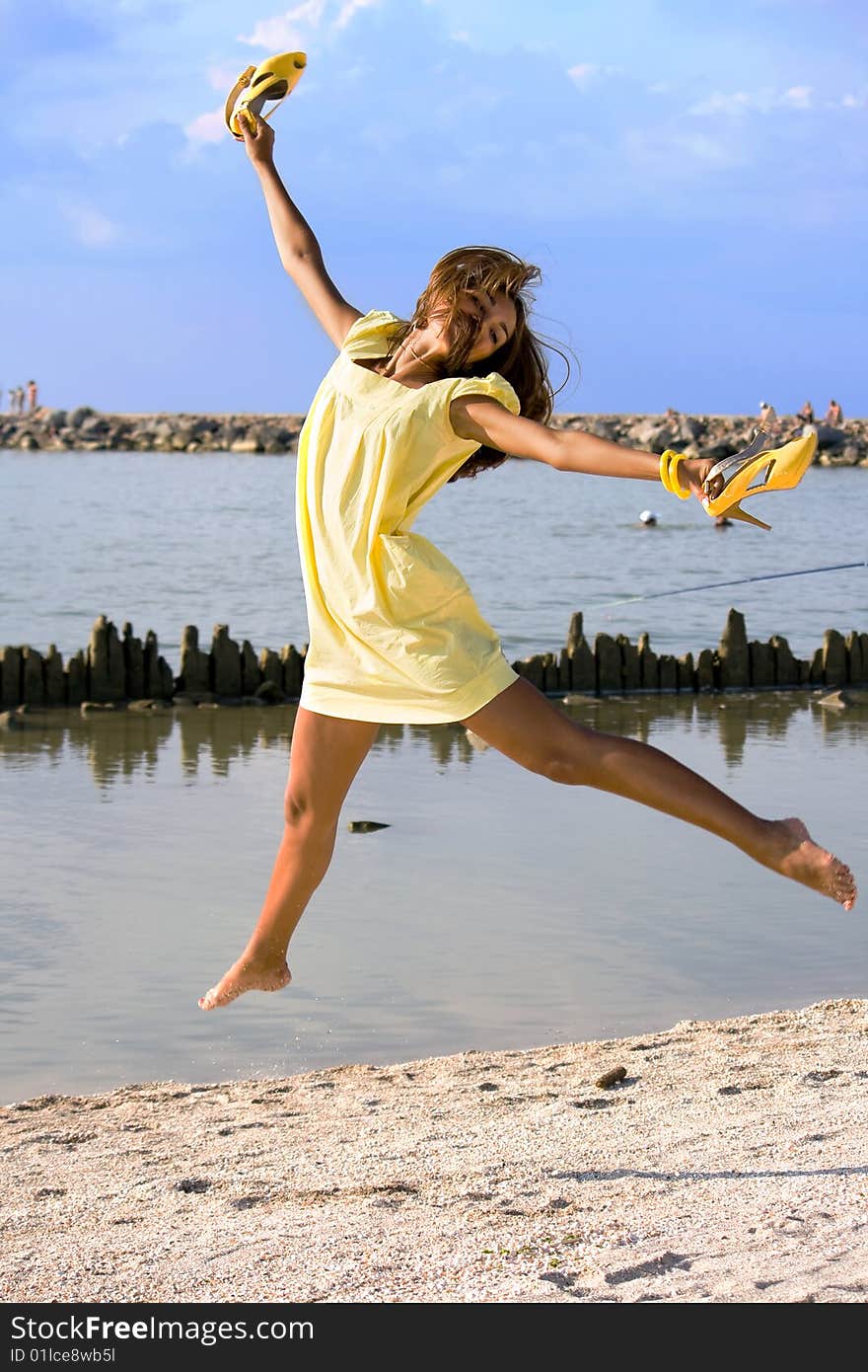 The girl frolic on the beach. The girl frolic on the beach