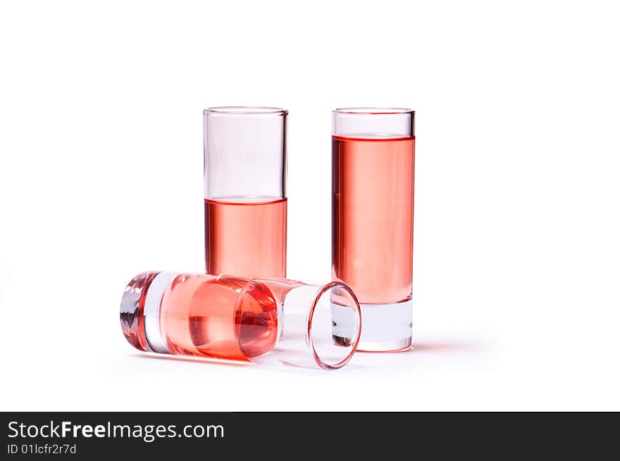 Thin glasses with pink liquid