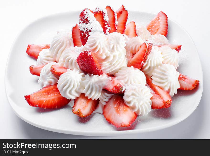 Dessert from a strawberry with creams. Dessert from a strawberry with creams.