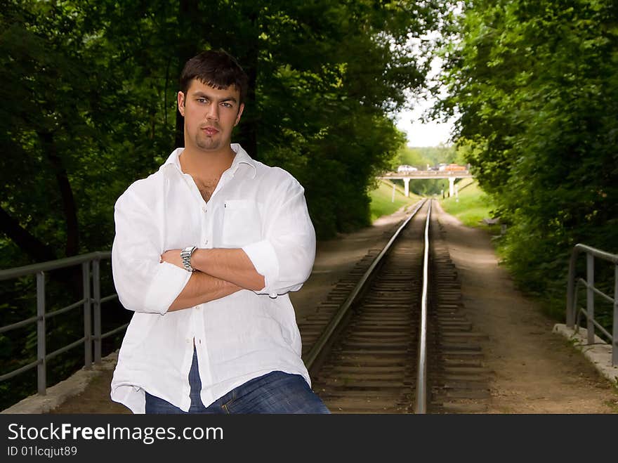 Handsome man on the railway