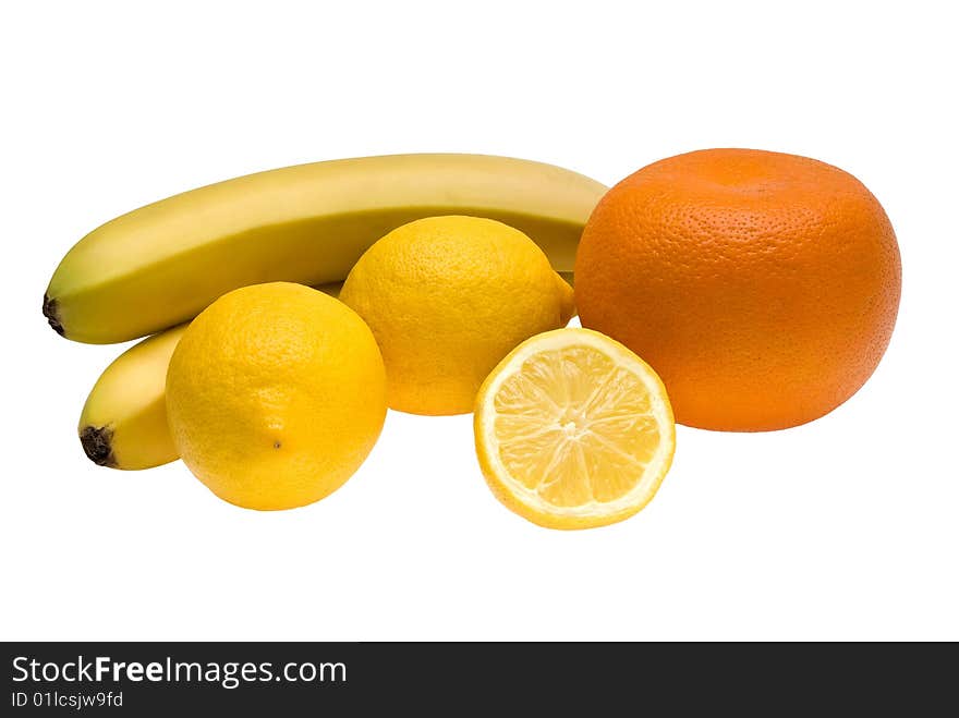 Two bananas, one grapefruit and two and a half lemon lying together on isolated white background. Two bananas, one grapefruit and two and a half lemon lying together on isolated white background