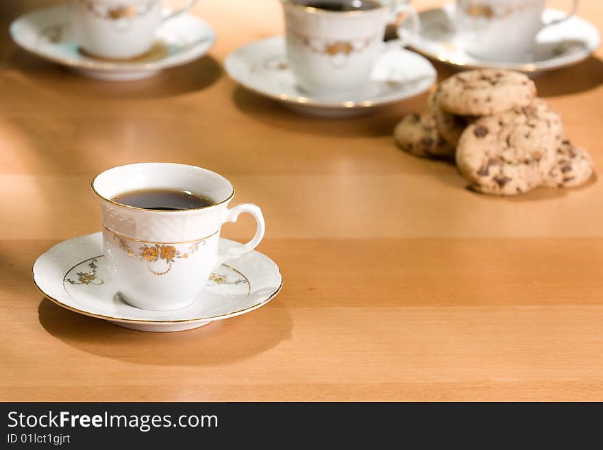 Cup of coffee and chocolate cookies