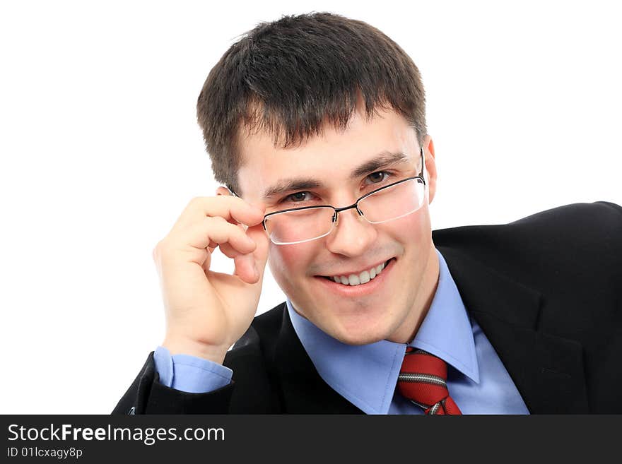 Business theme: handsome businessman in a work process. Business theme: handsome businessman in a work process.