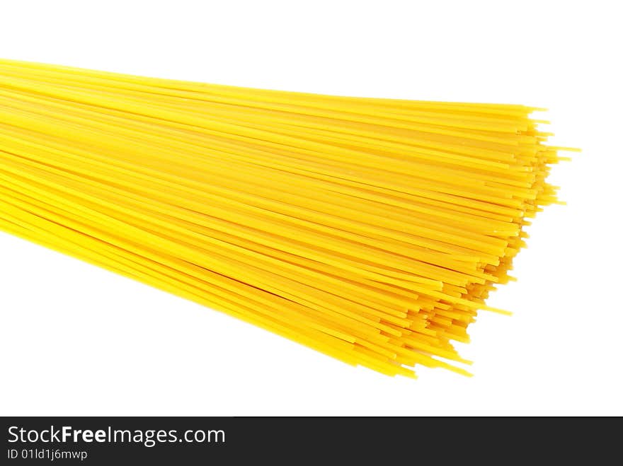 Yellow pasta on white background