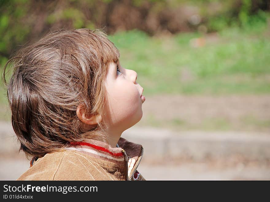 A child looks up emotional face