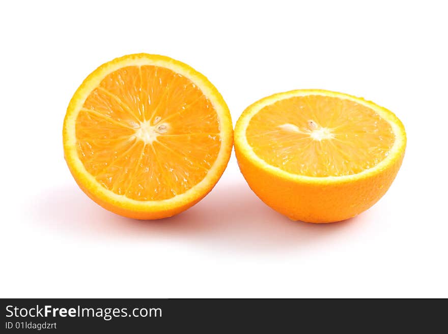 An orange cut into half isolated on white background.