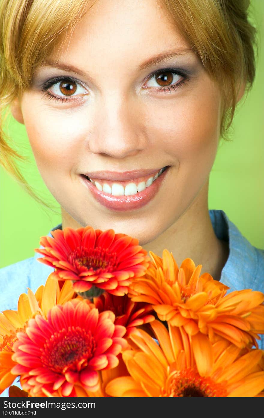 Beauty portrait of a young woman with a flowers. Beauty portrait of a young woman with a flowers