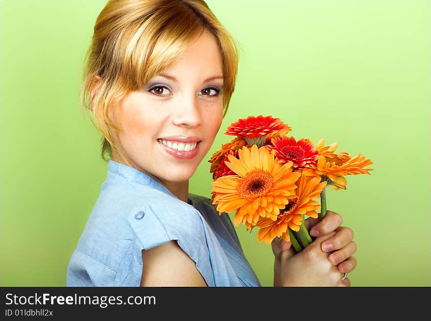 Beauty portrait of a young woman with a flowers. Beauty portrait of a young woman with a flowers