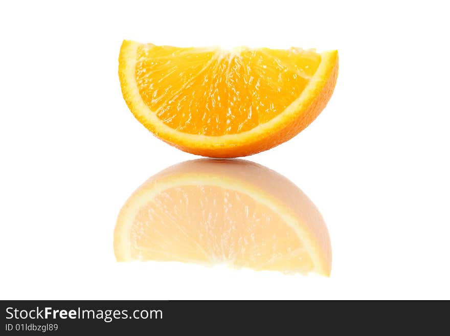 An orange piece isolated on white background. An orange piece isolated on white background.