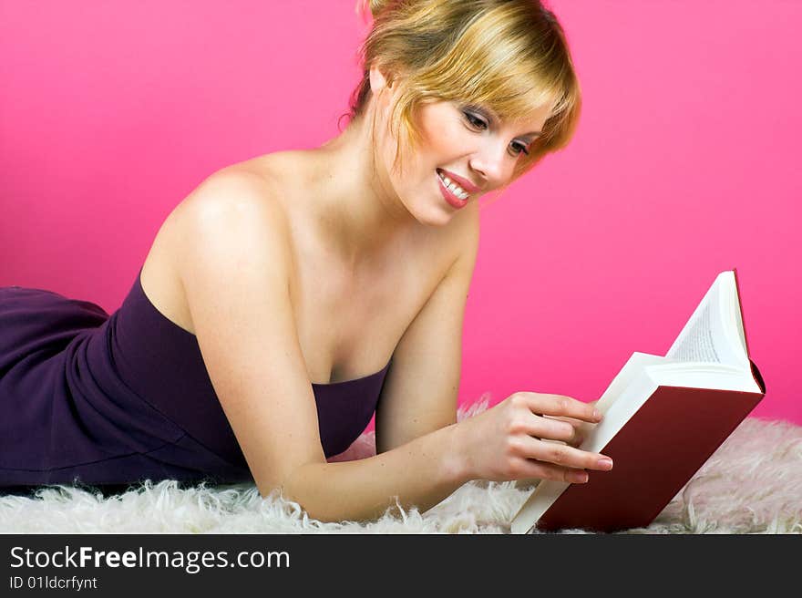 Young woman reading a book