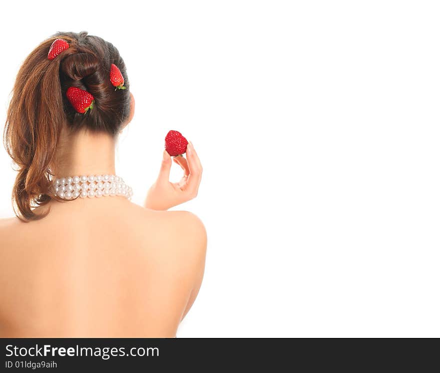 Young woman with fresh red strawberries