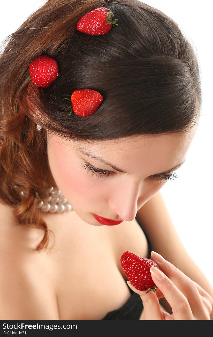 Sexy young woman eating fresh strawberry. Sexy young woman eating fresh strawberry